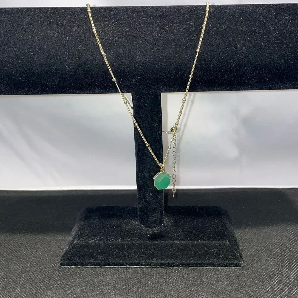 Delicate necklace with green stone